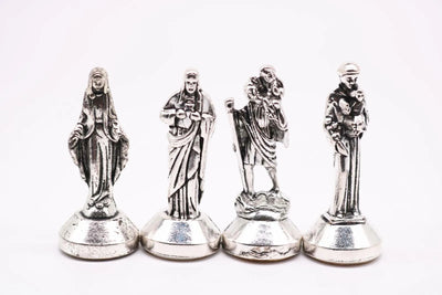 Christian Car Dashboard Decoration featuring silver figurines of Jesus, Lady Fatima, and other saints for spiritual inspiration.